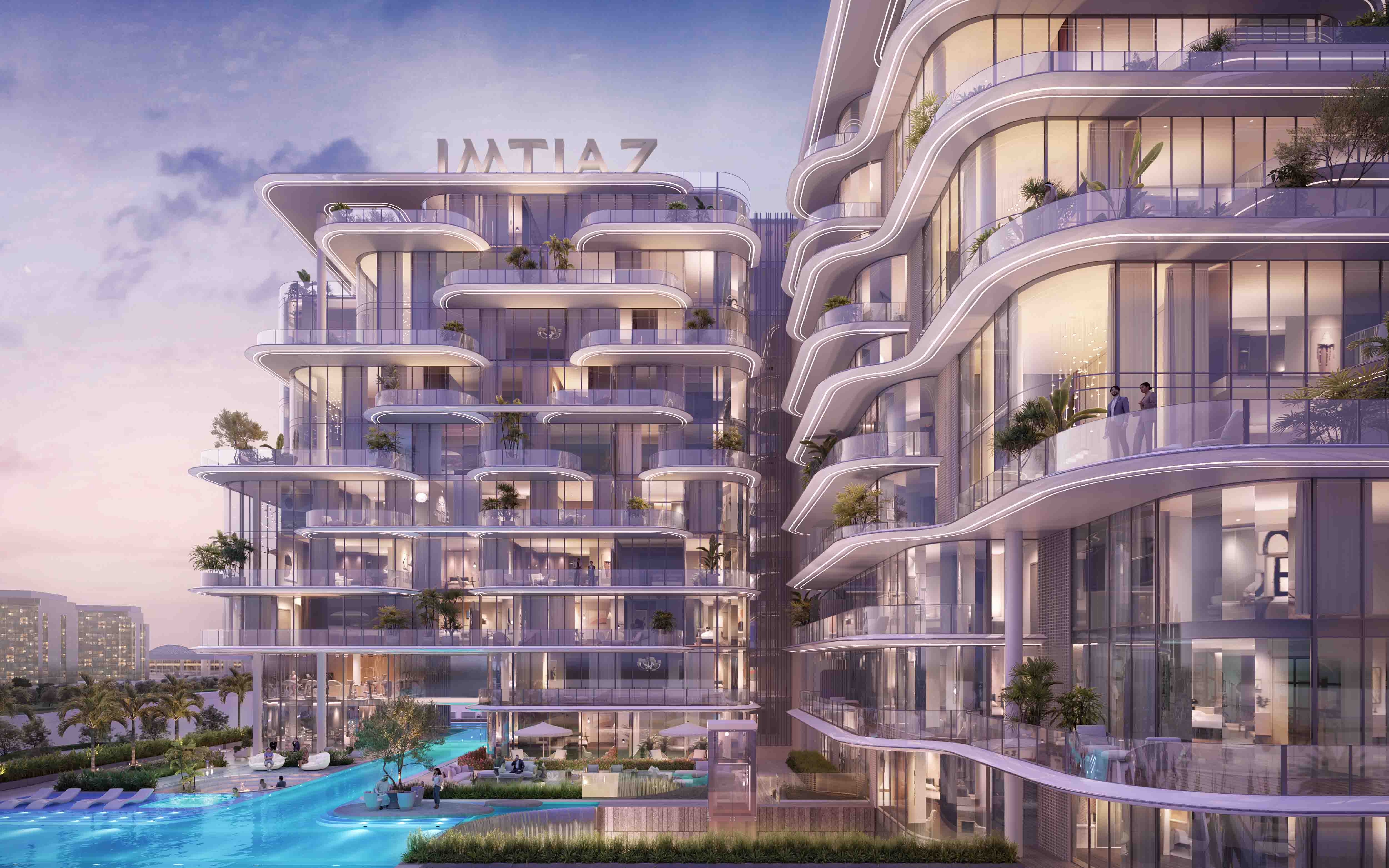 Cotier House 2 By Imtiaz A modern, curved architectural building with balconies, greenery, and a blue swimming pool in the foreground.